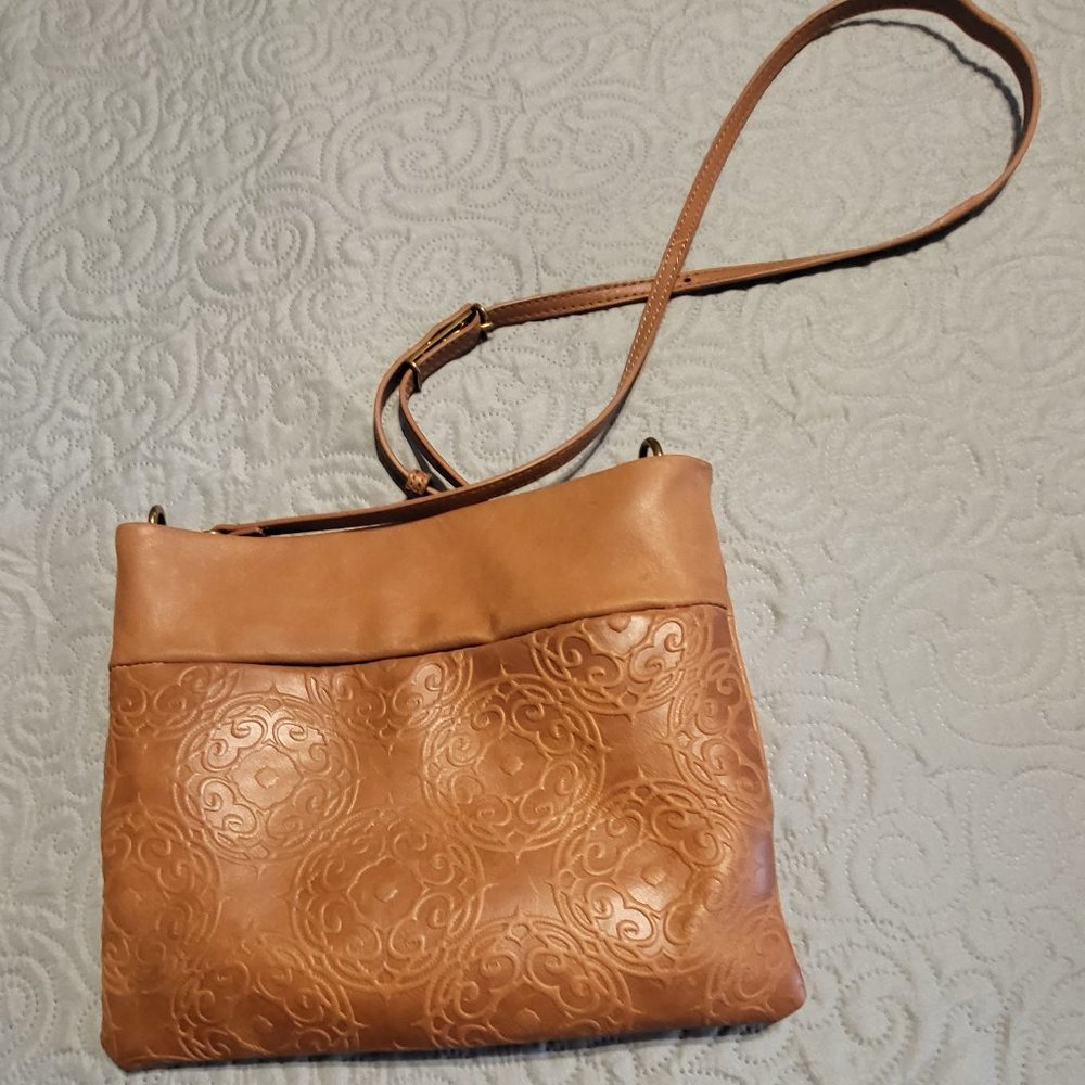 The Sak tan leather crossbody purse